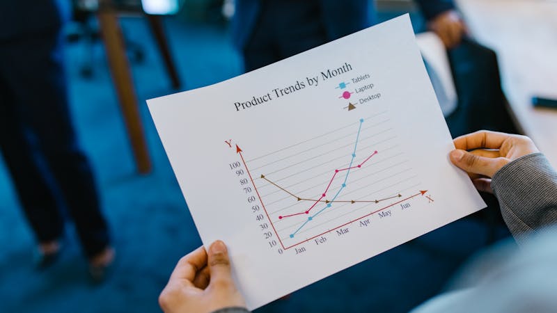 Product team preparing for a launch with planning materials on a desk