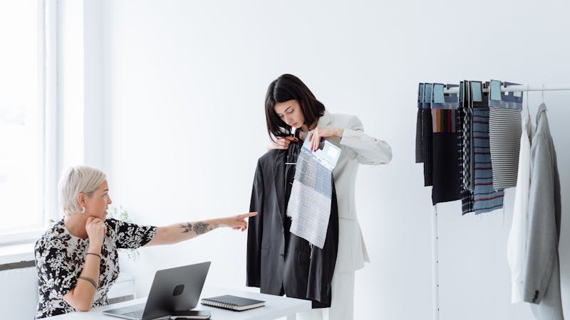 Brand and creator shaking hands in a collaborative partnership meeting
