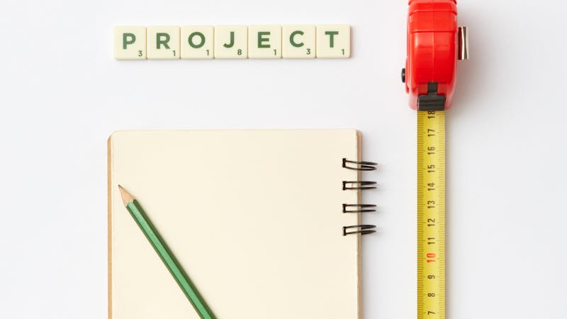 Developer setting up a new project workspace with tools and documentation