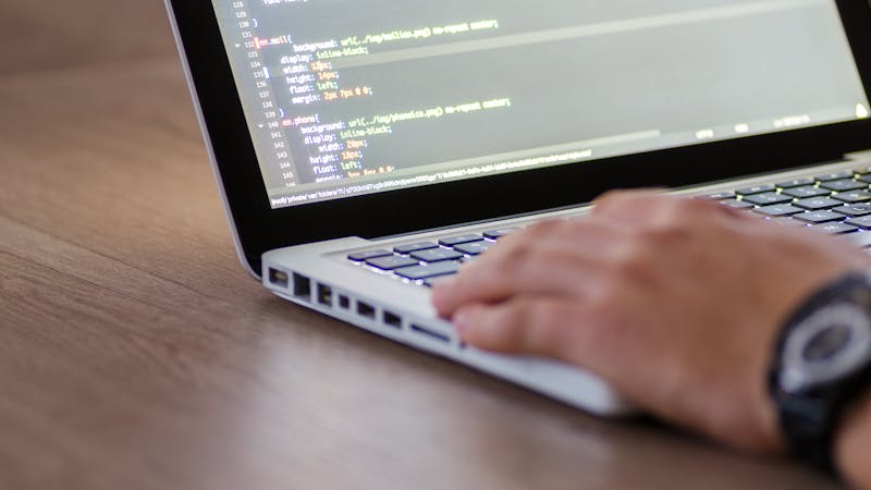 Monitor displaying clean structured code following programming best practices
