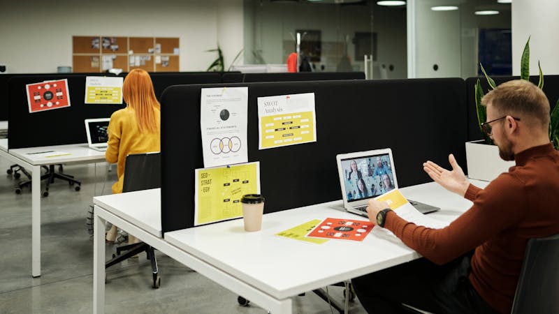 Remote and in-office team members connecting through a video call