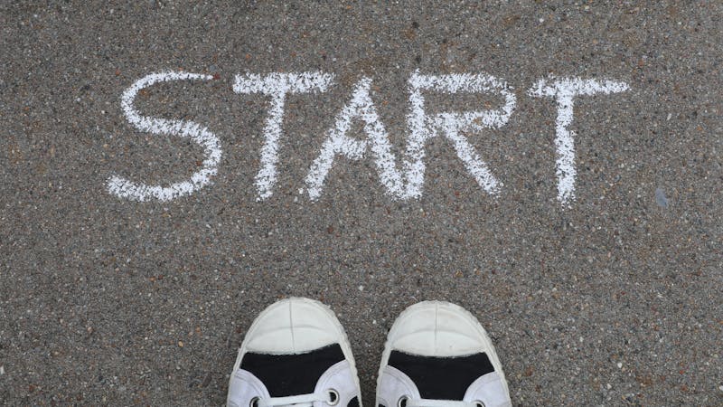 Person reading a getting started guide for a new application