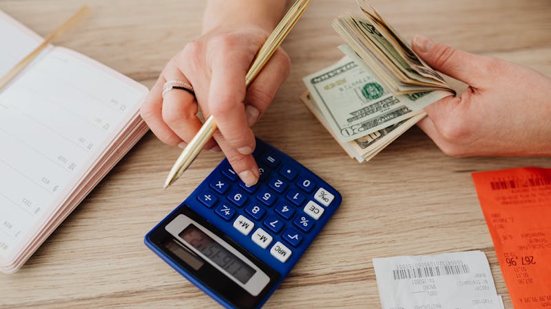 Budget planning spreadsheet with financial projections and calculator